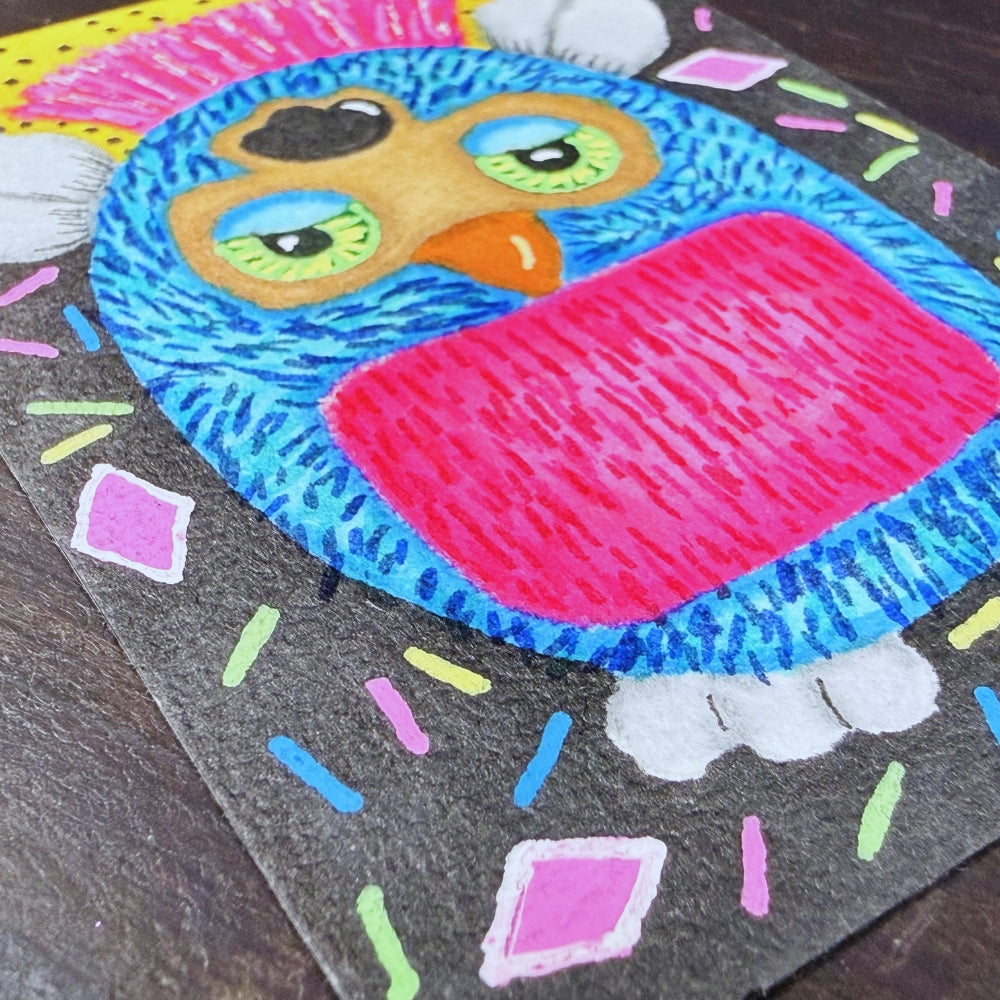 Colorful owl drawing on a black background with multicolored accents