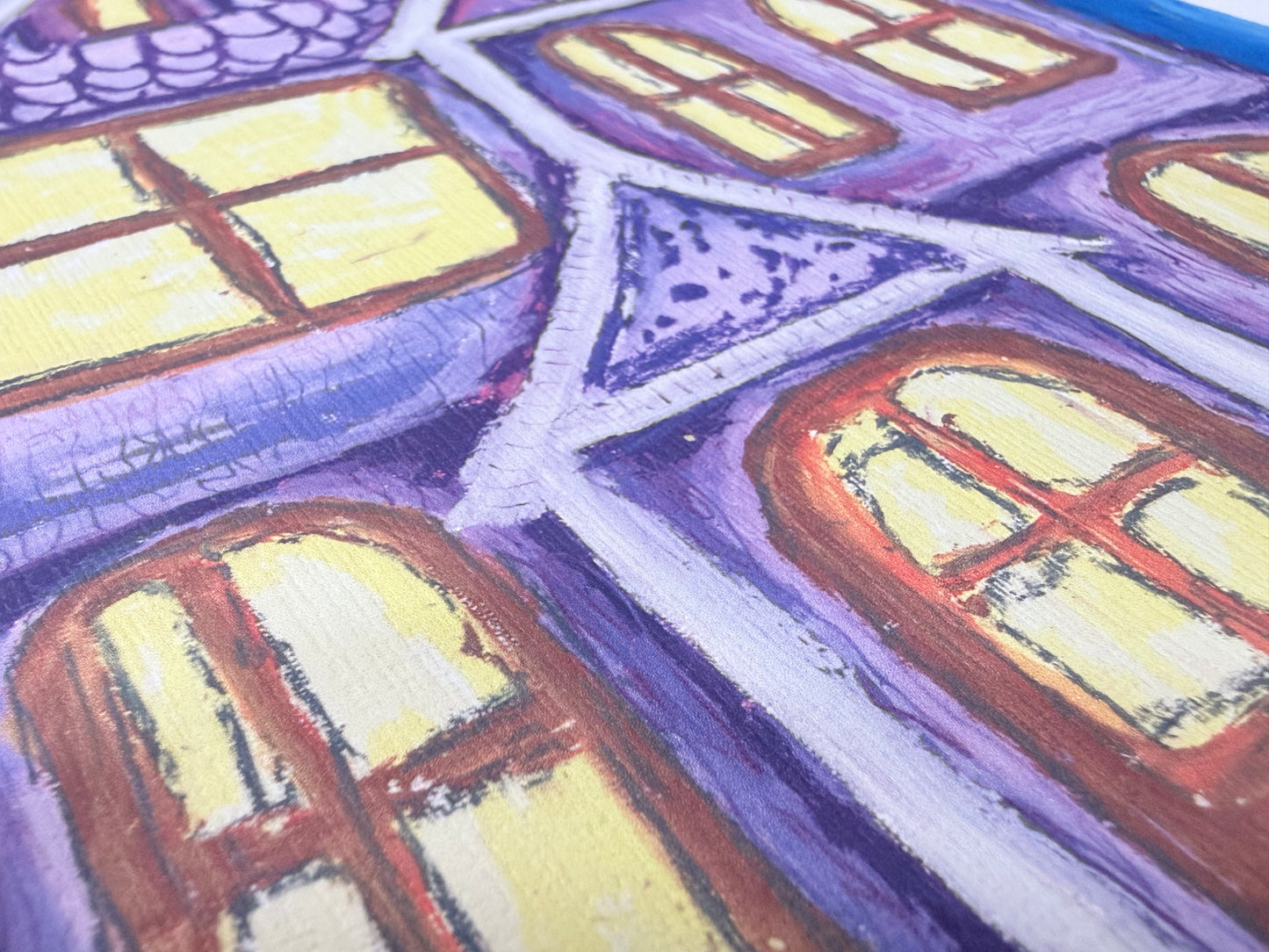 Close-up of a drawing of windows with a purple and blue background