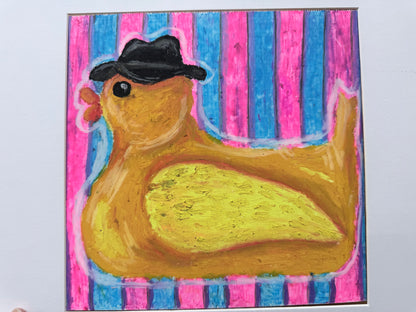 Yellow rubber duck wearing a black fedora againstpink and turquoise stripes, original oil pastel painting