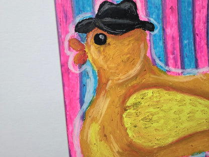 Yellow rubber duck wearing a black fedora againstpink and turquoise stripes, original oil pastel painting