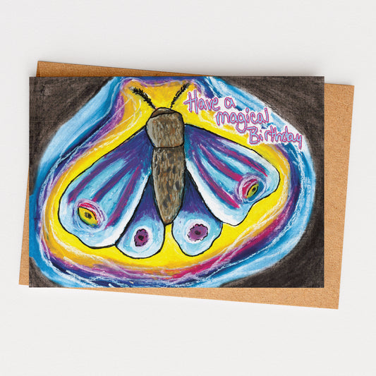 Greeting card with a colorful butterfly illustration and 'Have a magical birthday' text on a white background.